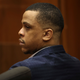 Defendant Eric Holder listens during opening statements in his murder trial, Wednesday, June 15, 2022, at Los Angeles Superior Court in Los Angeles. Holder, 32, faces one count of first degree-murder and two counts of attempted first-degree murder for the killing the Grammy Award-winning rapper Nipsey Hussle outside his clothing store three years ago.